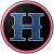The logo of the Romeros de Hormigueros: a navy "H" in a bold, forbidding typeface on a black circle, bordered in magenta-white-magenta.